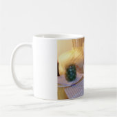 「どこだ」オーロスは? コーヒーマグカップ (左)