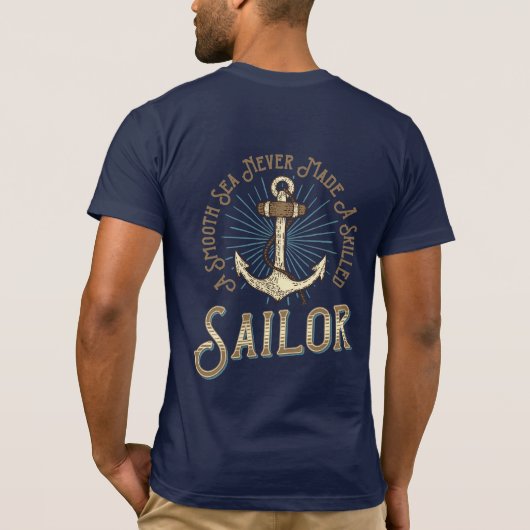なめらかな海で腕を磨く船乗りはいない 海事 アンカーT Tシャツ (裏面)