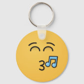 にこやかな目で口笛顔 キーホルダー (正面)