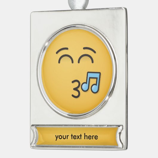 にこやかな目で口笛顔 シルバープレートバナーオーナメント (左)