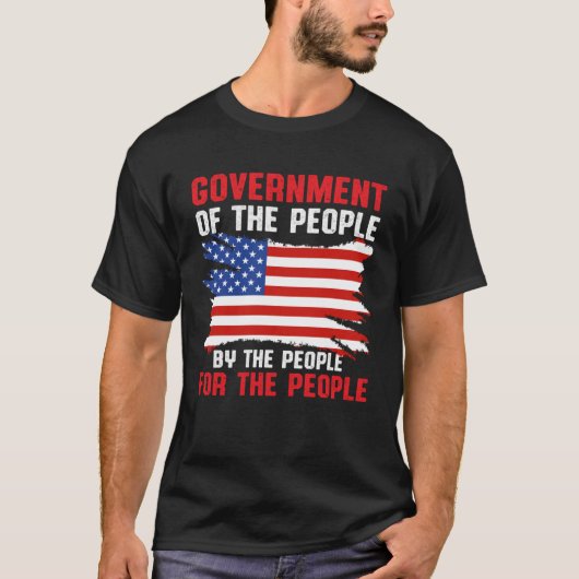 ~によるアメリカの愛国的政府 Tシャツ (正面)