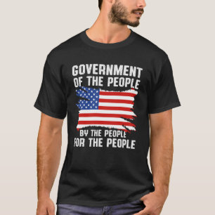 ~によるアメリカの愛国的政府 Tシャツ