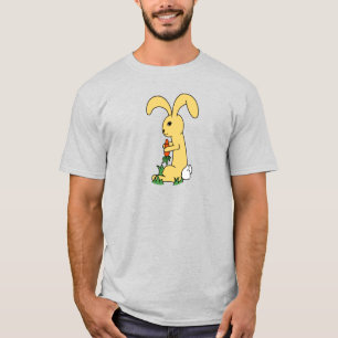 にんじんを持つ小さくてかわいい黄色の漫画のウサギ Tシャツ