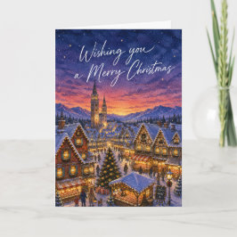 ぬくもりあふれる雪景色のクリスマスビレッジの水彩ホリデー カード