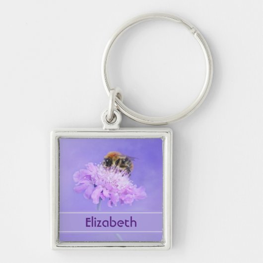 のまわりにがピンクの花に止まるパーソナライズされた キーホルダー (正面)