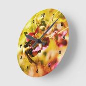 のまわりにオンピンク花抽象芸術 ラウンド壁時計 (傾斜)