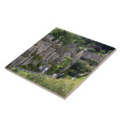 の村にあるコッツウォルドの石造りのコテージ タイル (側面)