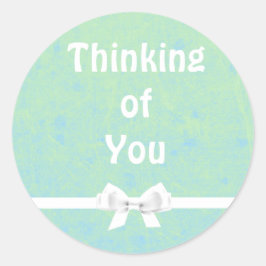 の考えティール（緑がかった色）とホワイトボウのシール ラウンドシール