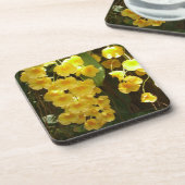 の黄色ぶら下がったい蘭の熱帯花 コースター (左側)