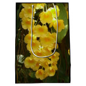 の黄色ぶら下がったい蘭の熱帯花 ミディアムペーパーバッグ (裏面)