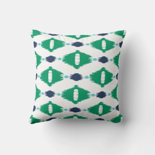 はっきりしたで幾何学的な緑および海軍種族のイカットは印刷します クッション (裏面)