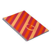 はっきりしたクランベリーレッド、オレンジ、桃ストライプ色 ノートブック (右側)