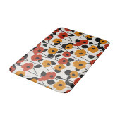 はっきりしたレトロ花柄レッド、オレンジ、ブラック バスマット (アングル)