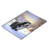 ひげのあるコリーで雪のクリスマスを過ごす ノートブック (左側)