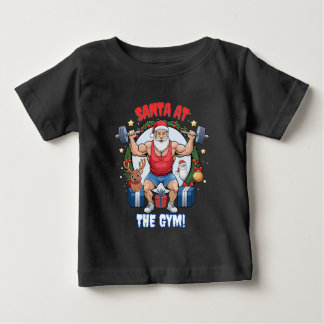 ひねりを持つサンタクロース – ジムサンタホリデーユーモア ベビーTシャツ