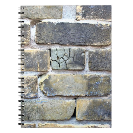 ひび割れた崩れやすいレンガの壁 ソフト グランジ ノートブック (正面)