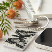 ひび割れた背景に黒と白の蝶 キーホルダー (正面右)