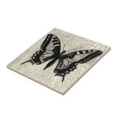 ひび割れた背景に黒と白の蝶 タイル (側面)