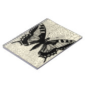 ひび割れた背景に黒と白の蝶 ノートブック (左側)