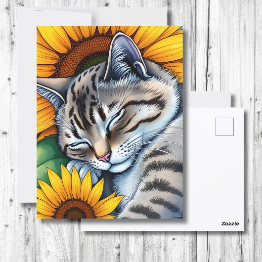 ひまわりのそばでお昼寝する灰色の可愛い猫 ポストカード