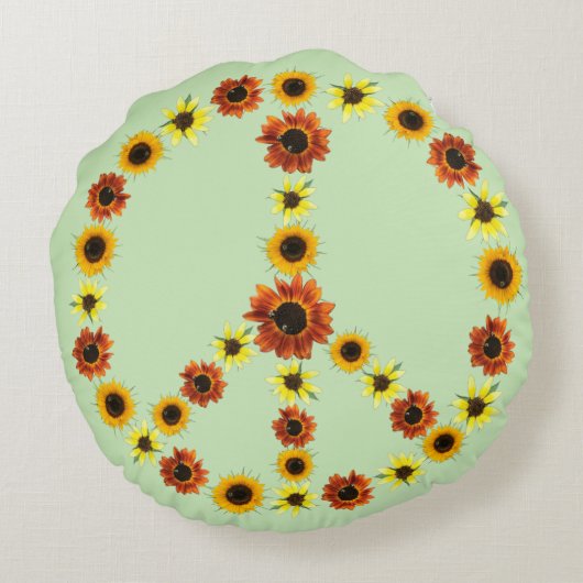 ひまわりの平和サイン淡い色の、緑の丸い枕 ラウンドクッション (裏面)