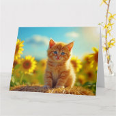 ひまわりの花畑で遊ぶ愛らしいオレンジ色の子猫 カード (黄色い花)