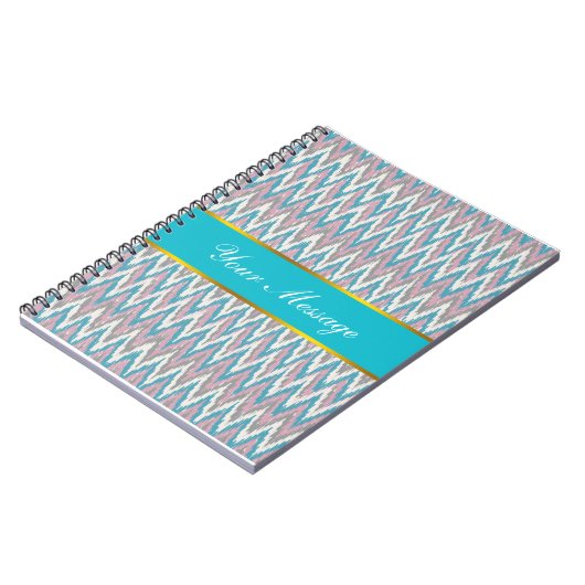 ほこりっぽいピンクとブルーのイカット ノートブック (左側)