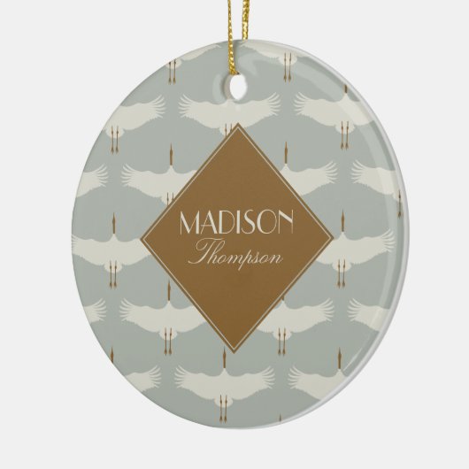 ほこりっぽい青の中性の鳥の鶴のアールデコモノグラム セラミックオーナメント (左)