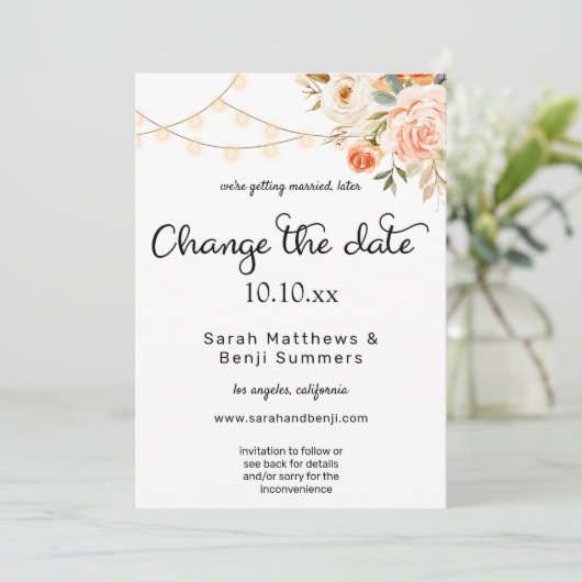 ほんのりピンクとオレンジの花とライトを変更日 招待状 (スタンド正面)