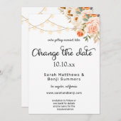 ほんのりピンクとオレンジの花とライトを変更日 招待状 (正面/裏面)