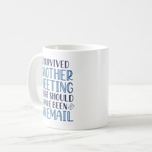 また生き延び会議がある コーヒーマグカップ (正面左)