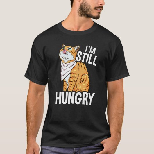 まだお腹がすいてる猫のイラスト ネコ好きな人へ Tシャツ (正面)