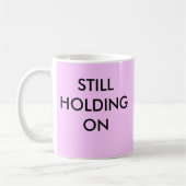 まだマグを握ること コーヒーマグカップ (左)