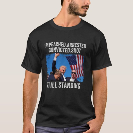 まだ立っている弾劾された有罪判決を受けた発砲 Tシャツ (正面)