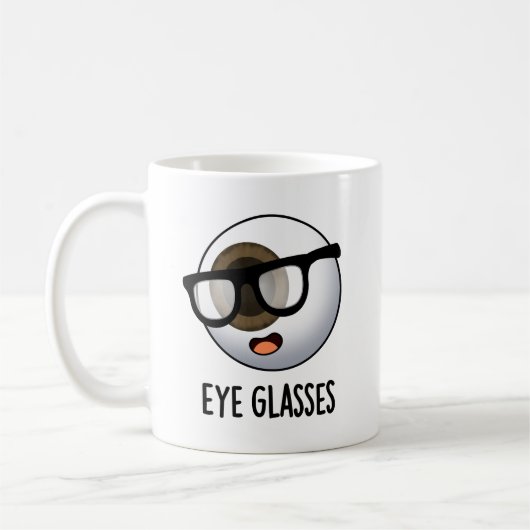 めがねの面白い眼球ダジャレ コーヒーマグカップ (左)