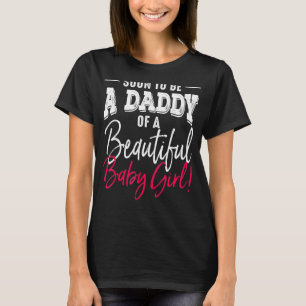 もうすぐ父親の日を待っているパパの赤ん坊の女の子になる Tシャツ