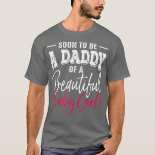 もうすぐ父親を待っているパパの赤ん坊の女の子になる Tシャツ