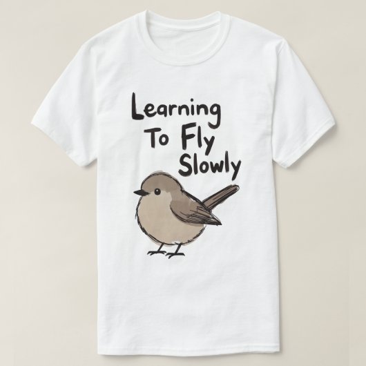 ゆっくり飛ぶことを学ぶ鳥 Tシャツ (デザイン正面)