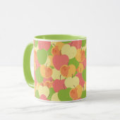 りんごを持つオーナメント マグカップ (正面左)