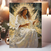 ろうそく付き輝くアフリカのクリスマスエンジェル シーズンカード