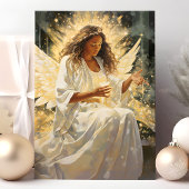 ろうそく付き輝くアフリカのクリスマスエンジェル シーズンカード