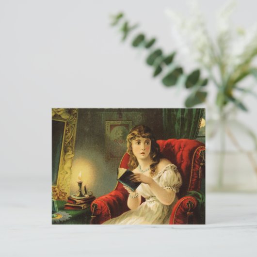 ろうそく読の明かりで若い婦人の顔が悪い ポストカード (スタンド正面)