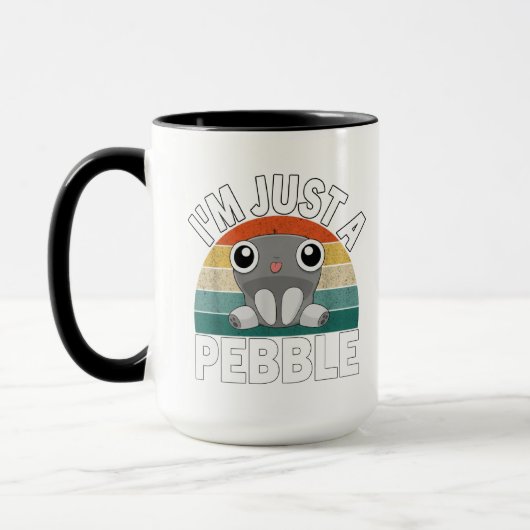 わたしは小さな石ころ, 石ころキッズTシャツ, 石ころ楽しい マグカップ (左)