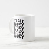 ~を手にする不気味 コーヒーマグカップ (正面左)