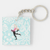 アイススケートするティール（緑がかった色）のダマスク織パターン キーホルダー (裏面)