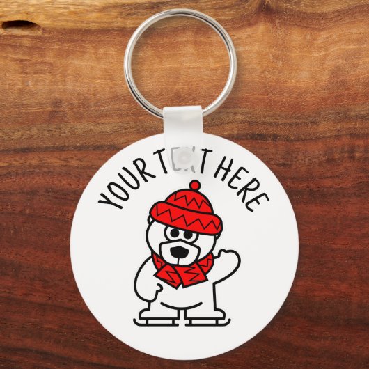 アイススケートで滑るのキッズキーチェーンのポーラークマの漫画 キーホルダー (正面)