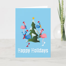 アイススケートで滑るフラミンゴスとクリスマスツリークリスマス シーズンカード