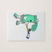 アイスホッケースティックとアイスホッケーでのアイススプレー ジグソーパズル (横)