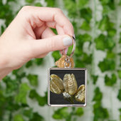 アイテムを調整する空のユリの種子ポッド キーホルダー (手)