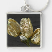 アイテムを調整する空のユリの種子ポッド キーホルダー (正面)